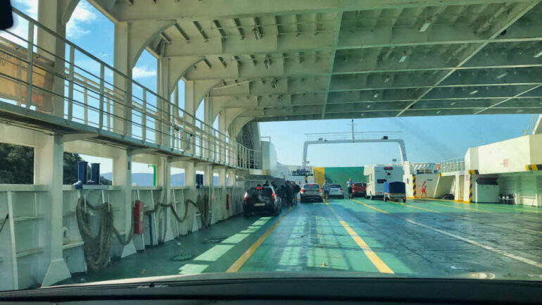 Driving with our car onto the ferry
