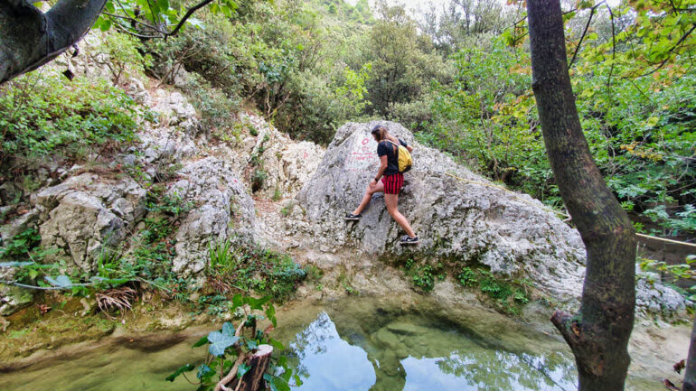 Climbing over a small lake close to Rabac