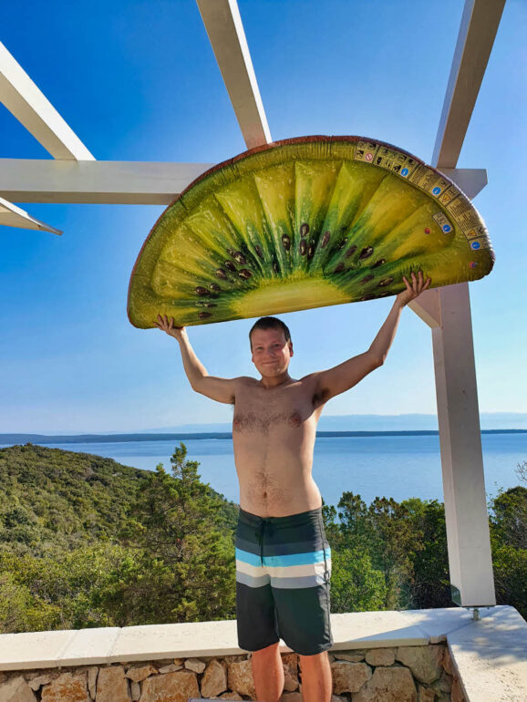 Steven holding an inflatable kiwi air mattress in Lošinj