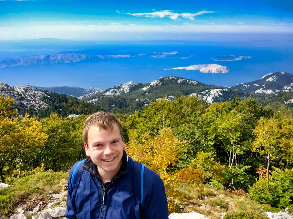 Steven and a view on the Adriatic Sea from Zavizan Mountain in Northern Velebit National Park